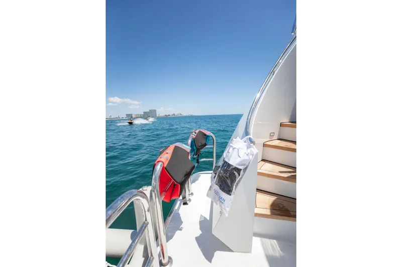 Slide: The Image of Woman on Intermarine RPH 95 yacht, 2001 model, enjoying sunny day on deck. - 20