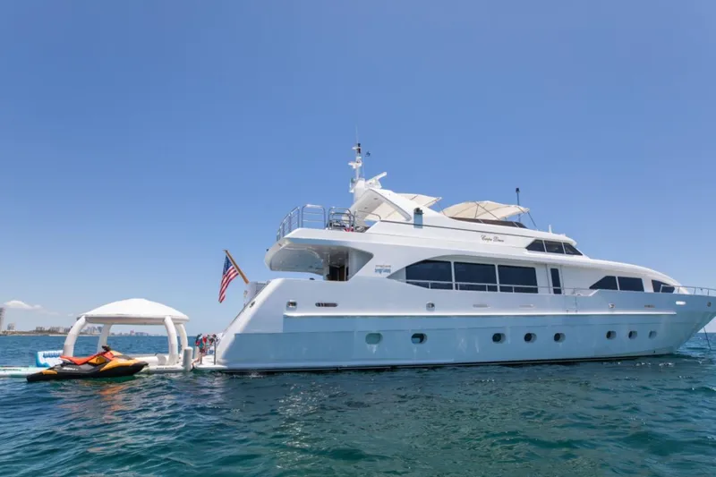 Slide: The Image of Two people relaxing on a yacht, Intermarine RPH 95, 2001, enjoying drinks. - 28
