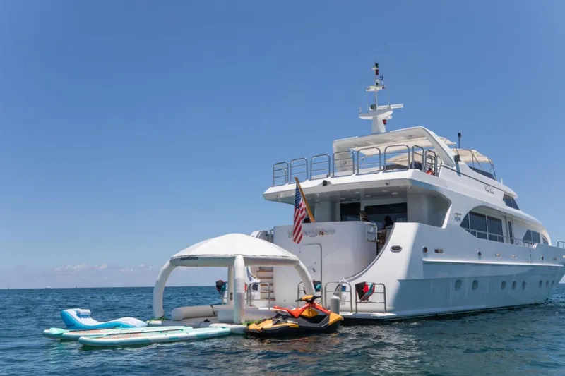 Slide: The Image of Luxurious 2001 Intermarine RPH 95 yacht interior with elegant dining area and scenic views. - 31