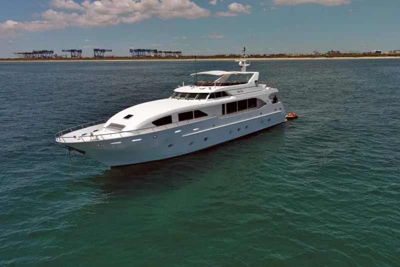 Slide: The Image of Luxurious 2001 Intermarine RPH 95 yacht interior with elegant wood finishes and carpeted stairs. - 36