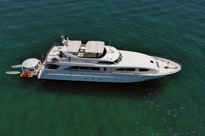 Slide: The Image of Luxurious bedroom interior of 2001 Intermarine RPH 95 yacht with wooden finishes and elegant decor. - 39