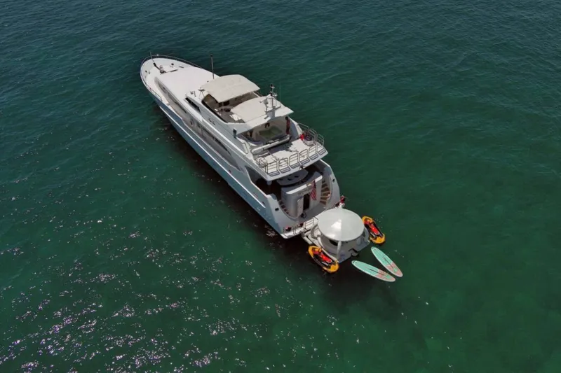 Slide: The Image of Luxurious bedroom interior of 2001 Intermarine RPH 95 yacht with elegant wood finishes. - 43