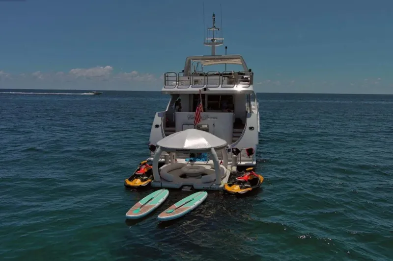 Slide: The Image of Flybridge of 2001 Intermarine RPH 95 yacht with helm station and seating. - 47