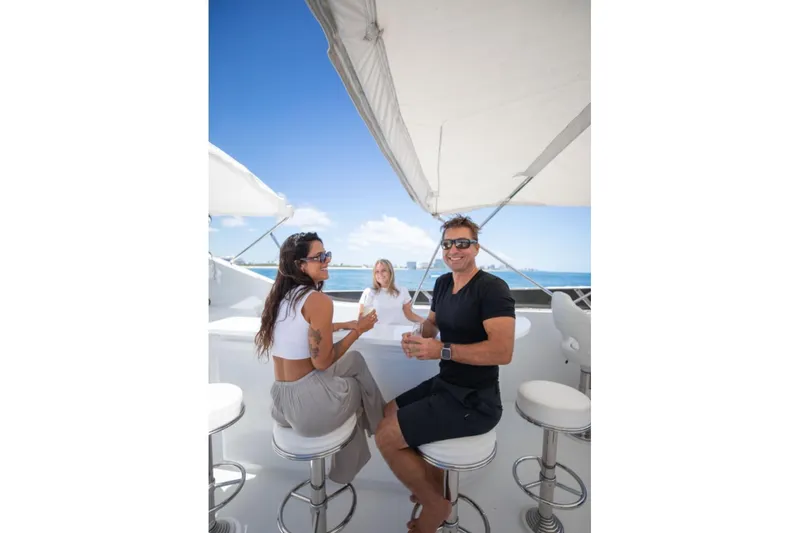 Slide: The Image of Luxury yacht Intermarine RPH 95, 2001 model, anchored in clear blue waters. - 9