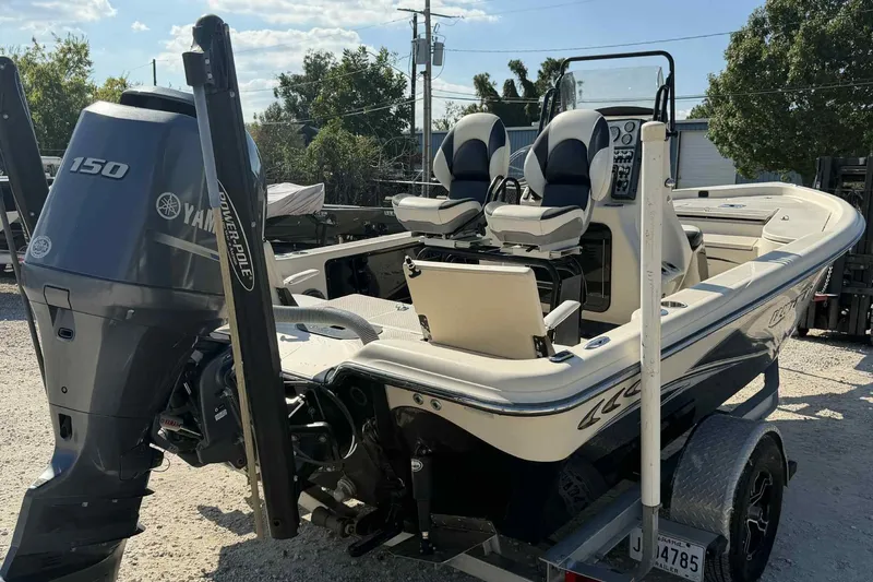 Slide: The Image of 2014 Blue Wave 2000 PureBay boat with Yamaha 150 engine on trailer. - 7