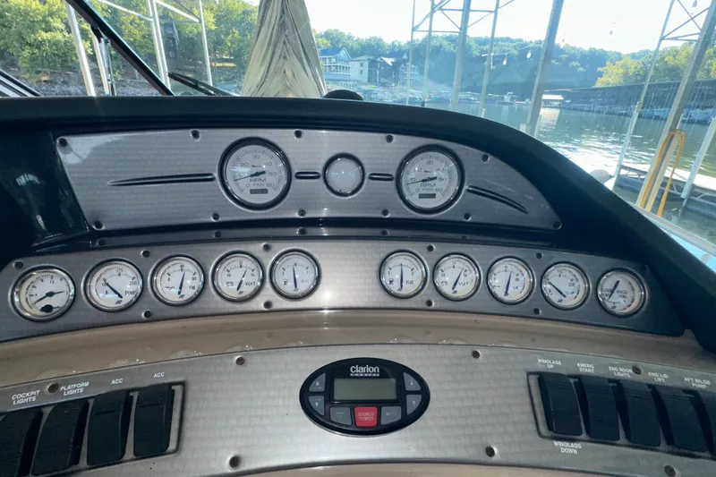 Slide: The Image of 2006 Four Winns 378 Vista yacht docked in a covered marina. - 14