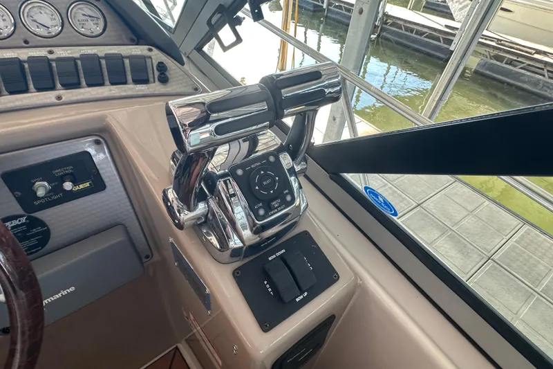 Slide: The Image of 2006 Four Winns 378 Vista yacht docked in a covered marina. - 18