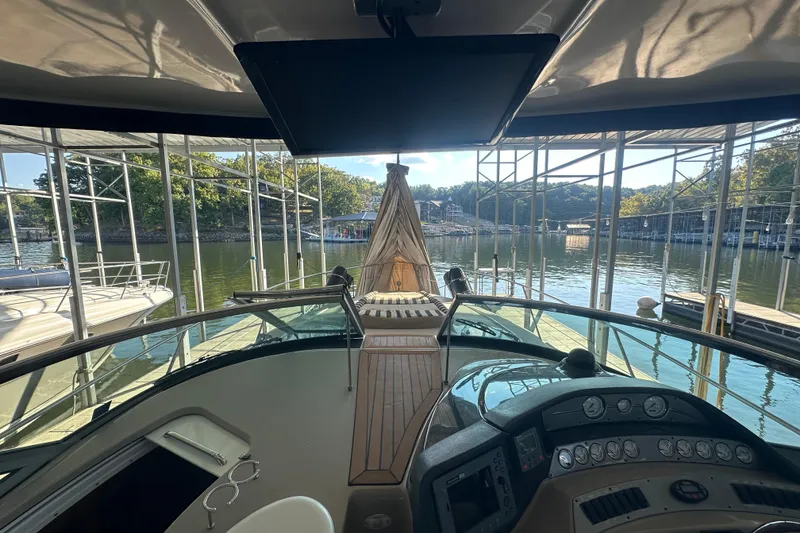 Slide: The Image of Dashboard of 2006 Four Winns 378 Vista boat with gauges and controls. - 24