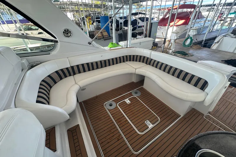 Slide: The Image of Control panel of a 2006 Four Winns 378 Vista boat, featuring throttle and navigation controls. - 28