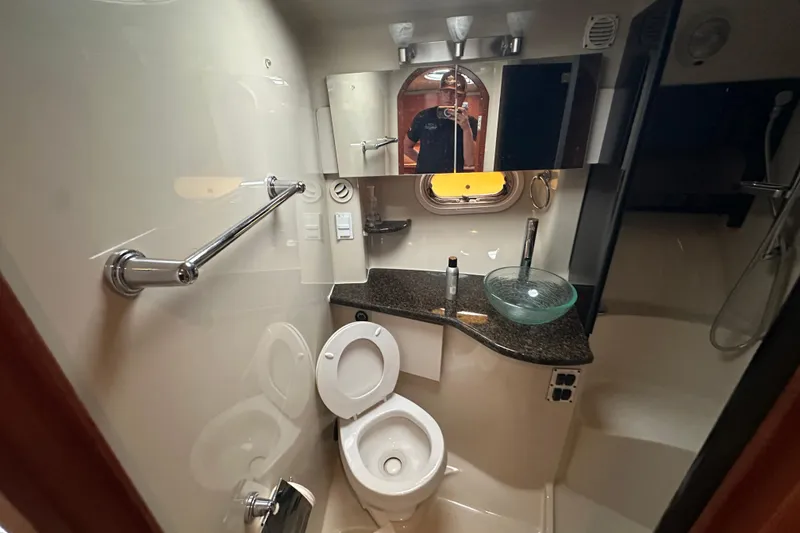 Slide: The Image of Luxurious 2006 Four Winns 378 Vista yacht interior with elegant seating and wooden finishes. - 44