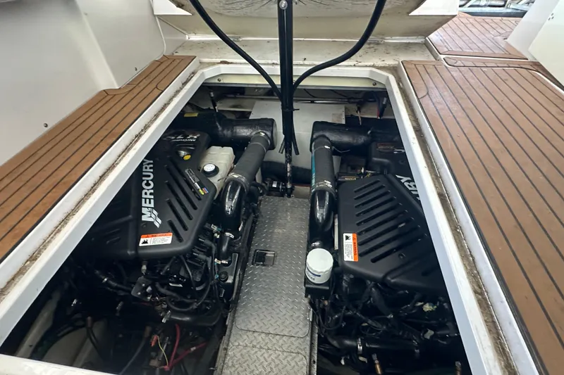 Slide: The Image of 2006 Four Winns 378 Vista yacht interior with open fridge and wooden cabinetry. - 60