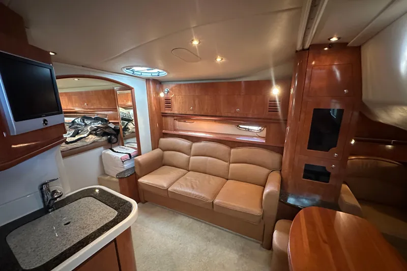 Slide: The Image of Luxurious interior of 2006 Four Winns 378 Vista yacht with leather seating and modern amenities. - 69