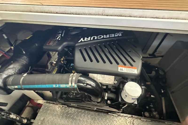 Slide: The Image of Engine compartment of 2006 Four Winns 378 Vista with Mercury engine visible. - 72