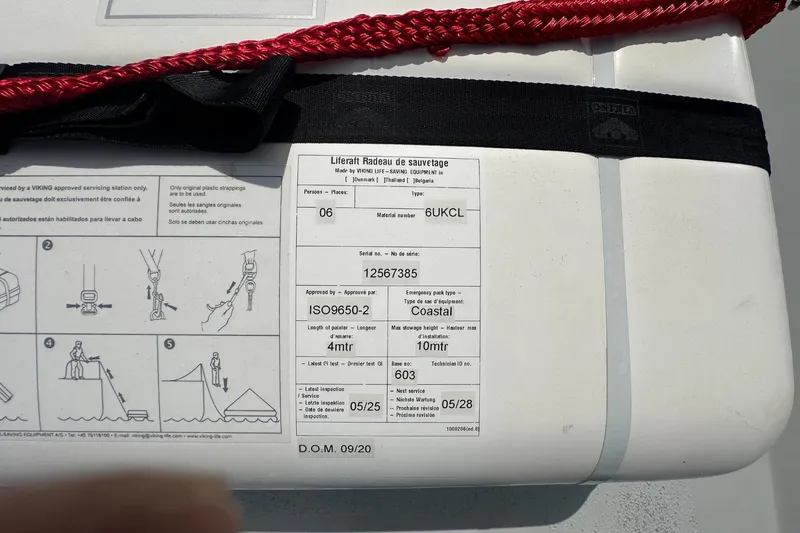 Slide: The Image of Safety instructions on a 1987 Albin North Sea Trawler equipment with red strap. - 27