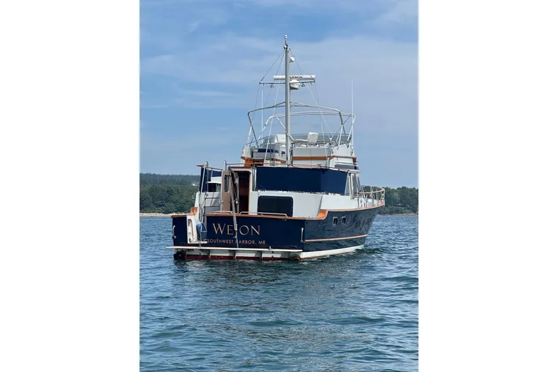 Slide: The Image of 1987 Albin North Sea Trawler on water, rear view, clear sky, Southwest Harbor, ME. - 3