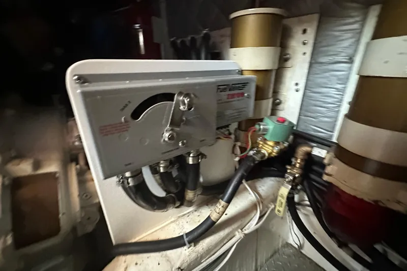 Slide: The Image of Engine room of 1987 Albin North Sea Trawler with mechanical components and wiring. - 34