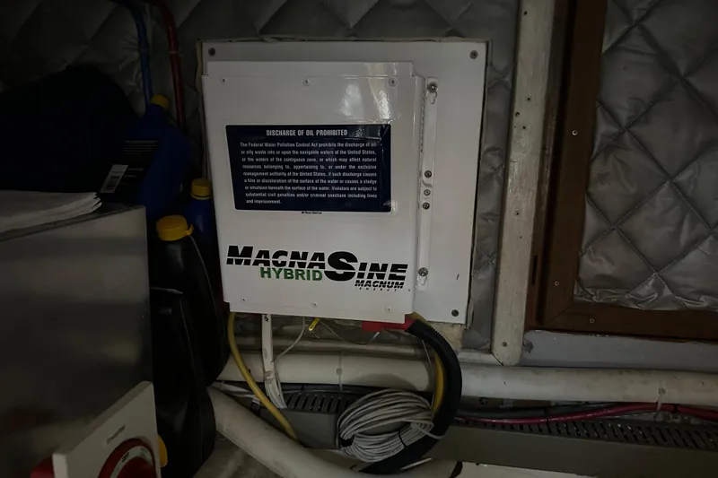 Slide: The Image of Electrical panel in 1987 Albin North Sea Trawler engine room with MagnaSine Hybrid inverter. - 39