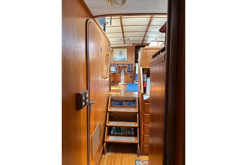 Slide: The Image of Interior of 1987 Albin North Sea Trawler with wooden paneling and stairs. - 76