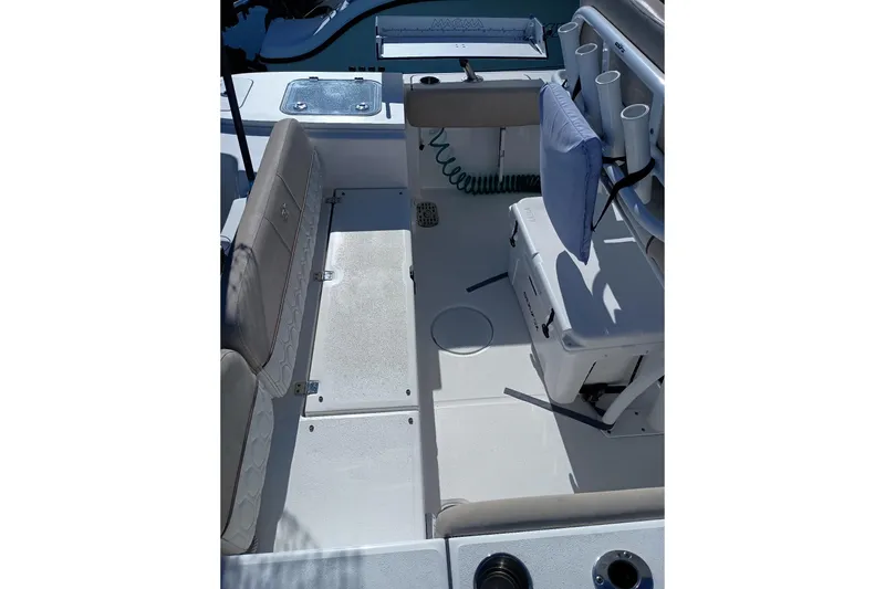 Slide: The Image of 2021 Sea Fox 228 Commander boat interior with seating and storage compartments. - 6