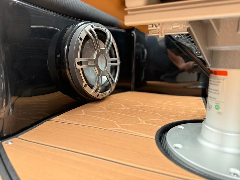 Slide: The Image of 2025 Yamaha Boats 255XD interior speaker and deck detail. - 34