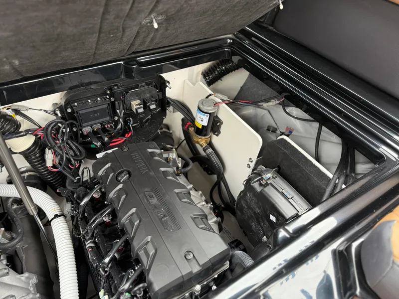 Slide: The Image of 2025 Yamaha Boats 255XD engine compartment, showcasing advanced marine engineering. - 74