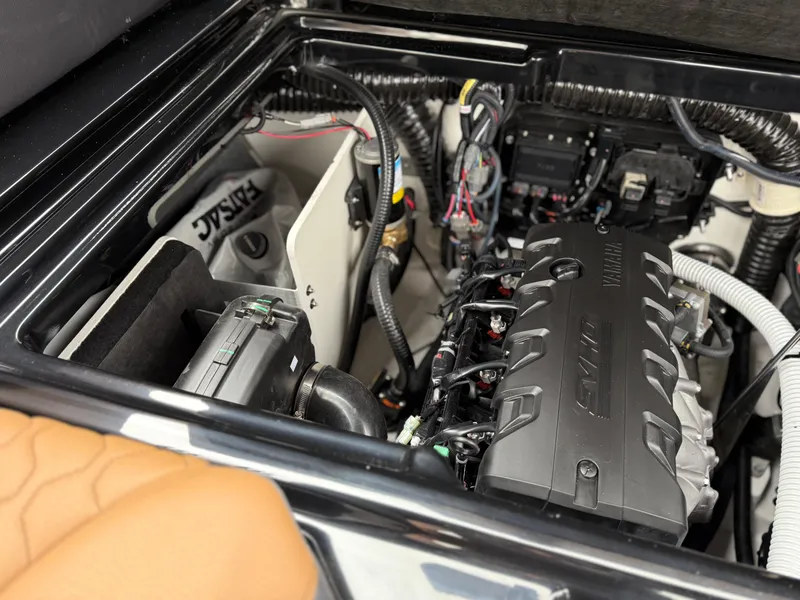 Slide: The Image of Engine compartment of 2025 Yamaha Boats 255XD, showcasing advanced marine technology. - 75