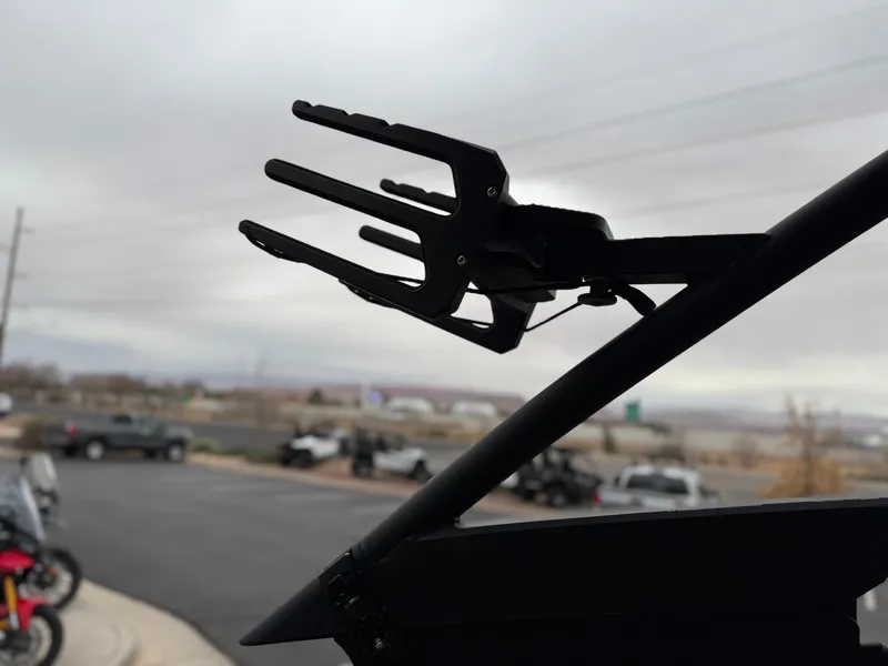 Slide: The Image of Wakeboard rack on 2025 Yamaha Boats 255XD against cloudy sky. - 81