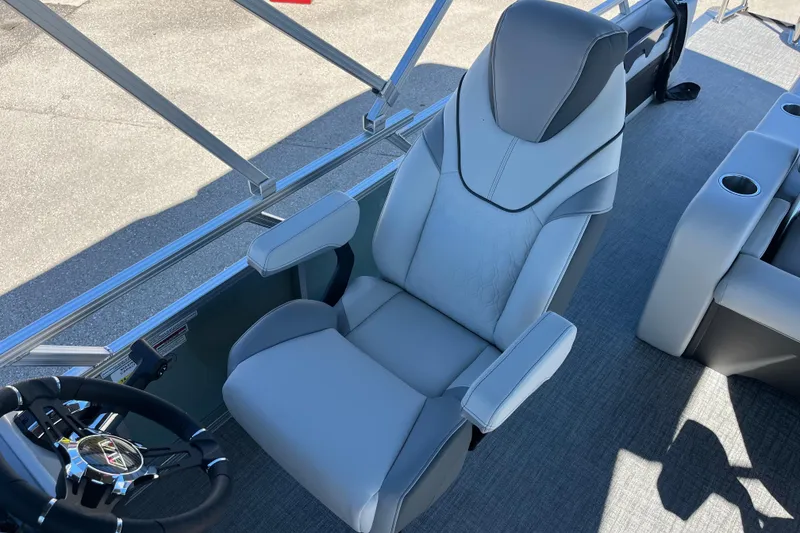 Slide: The Image of Luxurious captain's chair in 2026 Avalon 2585 Venture 85 VRB Tri Toon boat. - 18