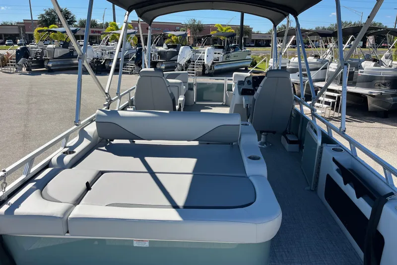 Slide: The Image of 2026 Avalon 2585 Venture 85 VRB Tri Toon boat interior with seating and helm. - 9