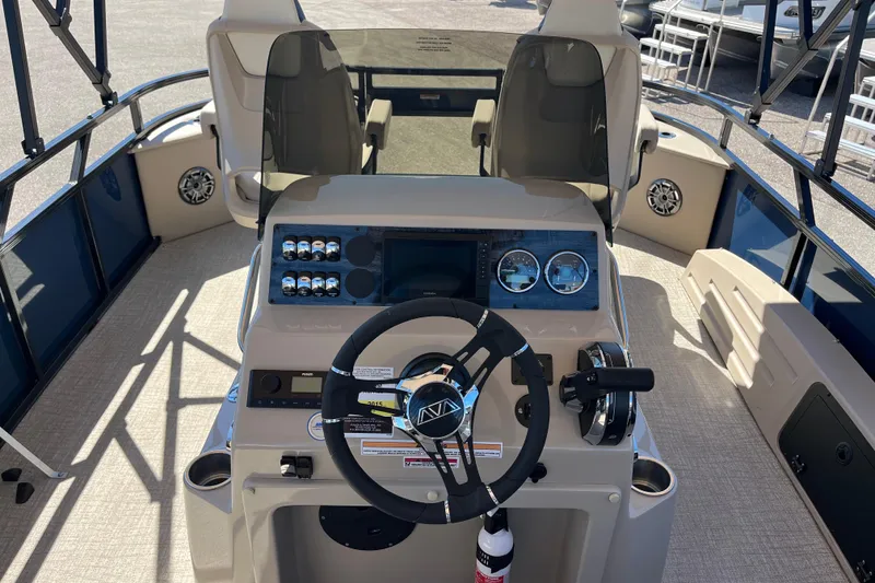 Slide: The Image of 2025 Avalon 2585 Venture 85 center console with modern controls and seating. - 12