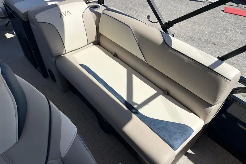 Slide: The Image of 2025 Avalon 2585 Venture boat interior with beige and blue seating, center console. - 22