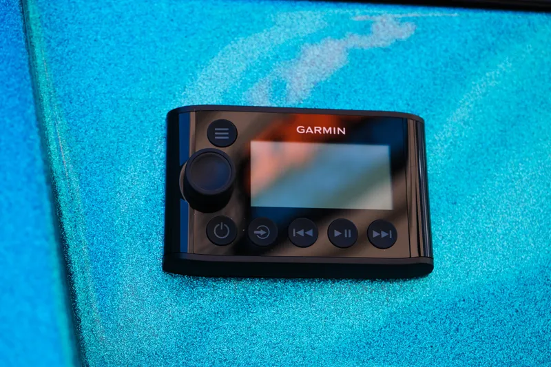 Slide: The Image of Garmin control panel on 2026 Moomba Max boat, set against a vibrant blue background. - 12
