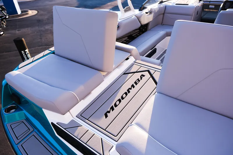 Slide: The Image of 2026 Moomba Max boat interior with sleek seating and stylish design. - 13