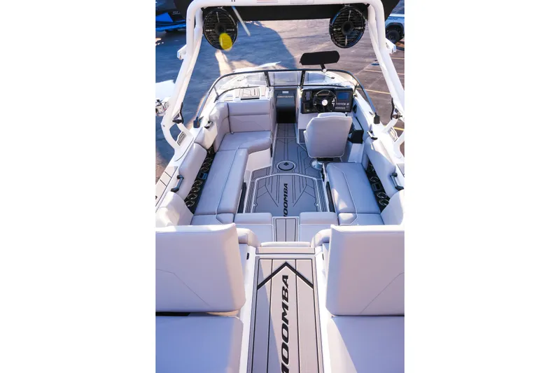 Slide: The Image of 2026 Moomba Max boat interior with sleek seating and modern dashboard design. - 14