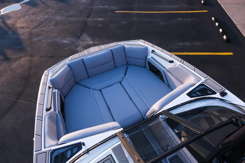 Slide: The Image of 2026 Moomba Max boat interior with spacious seating and modern design. - 22