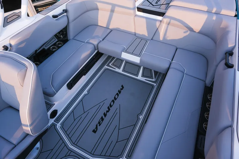Slide: The Image of 2026 Moomba Max boat interior with spacious seating and sleek design. - 23