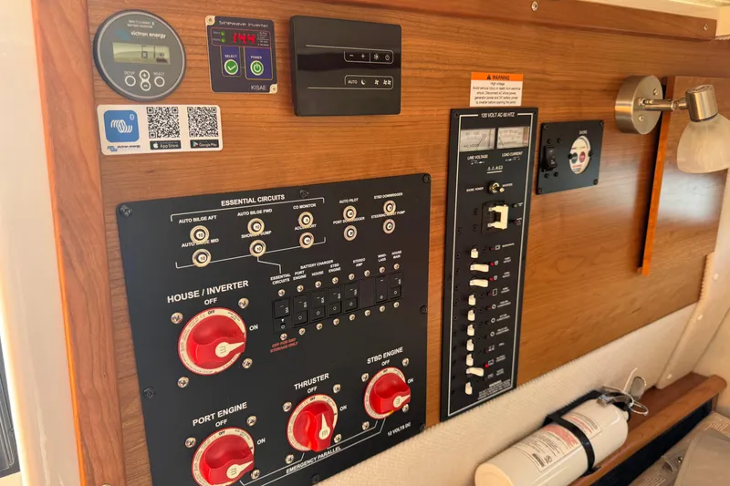 Slide: The Image of Control panel of 2026 Cutwater C-288 CB boat with essential circuits and switches. - 17