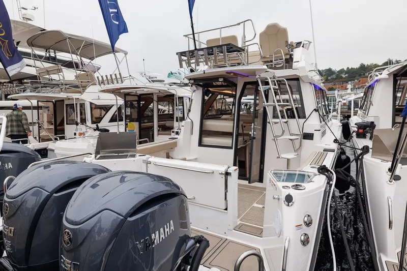 Slide: The Image of Manufacturer Provided Image: 2026 Cutwater C-288 CB boat with Yamaha engines docked at marina. - 4