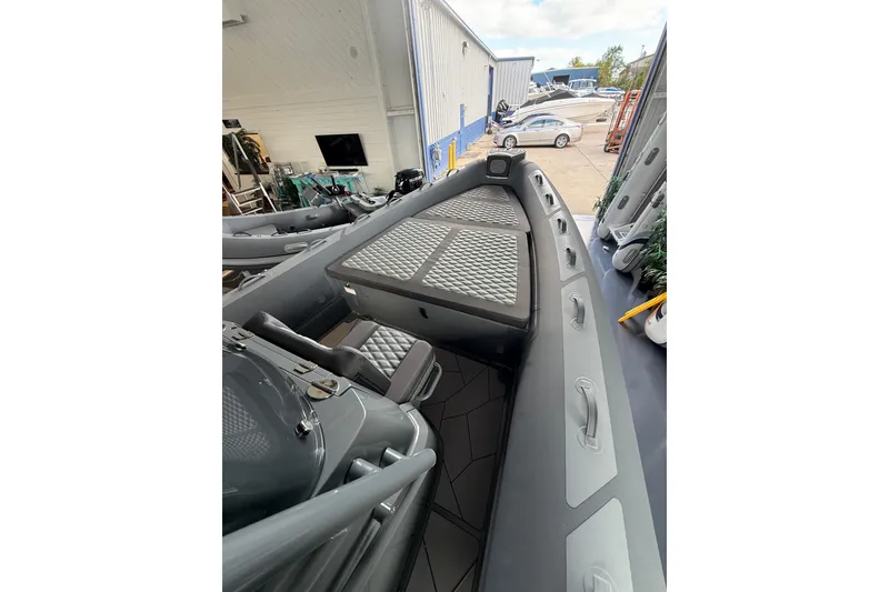 Slide: The Image of 2025 Highfield Sport 800 boat interior with sleek seating and modern design. - 10