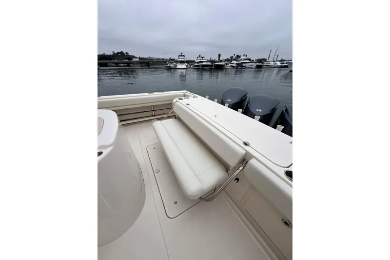 Slide: The Image of 2018 Grady-White Express 370 boat with triple outboard motors, viewed from above. - 13