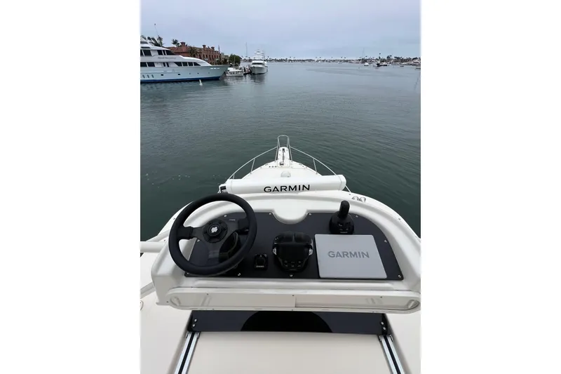 Slide: The Image of Engine compartment of 2018 Grady-White Express 370 boat, showcasing wiring and components. - 18