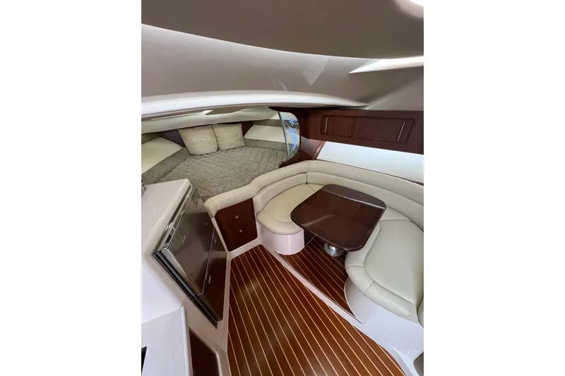 Slide: The Image of Interior of 2018 Grady-White Express 370 boat with modern kitchen and seating area. - 26