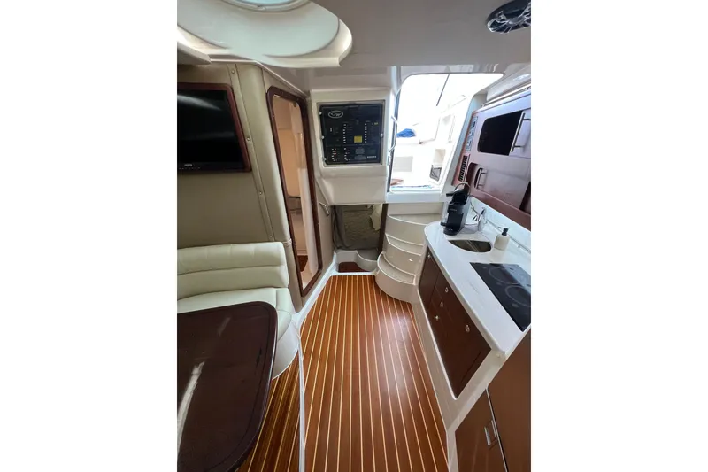 Slide: The Image of 2018 Grady-White Express 370 boat bathroom with shower, sink, and toilet. - 27