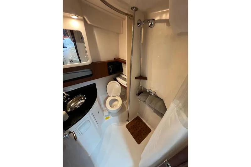 Slide: The Image of 2018 Grady-White Express 370 bathroom with shower, sink, and toilet. - 28