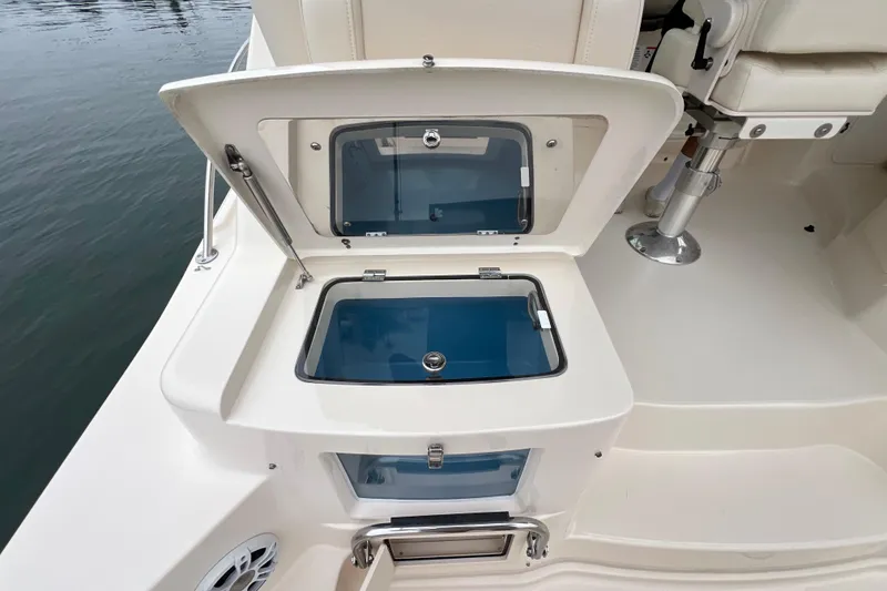 Slide: The Image of Helm of 2018 Grady-White Express 370 with advanced navigation and control systems. - 7