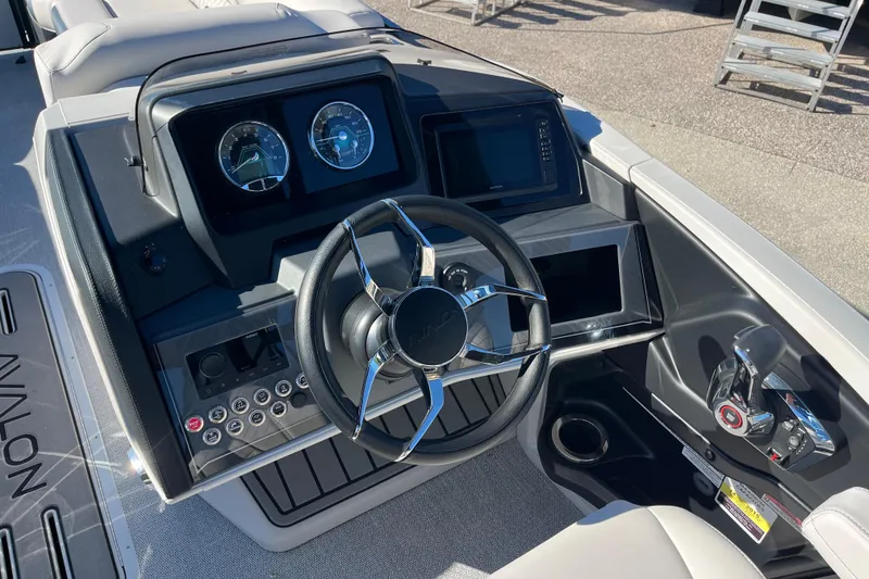 Slide: The Image of 2026 Avalon 2585 Catalina VRB boat dashboard with steering wheel and control panel. - 12