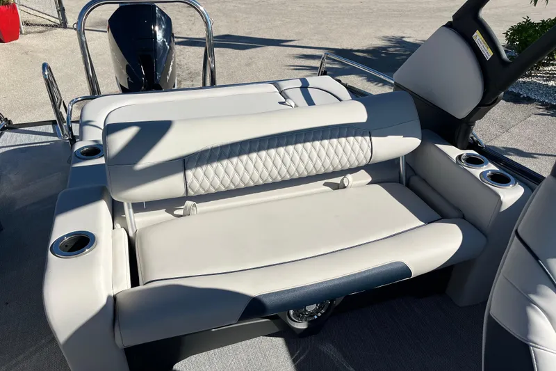 Slide: The Image of 2026 Avalon 2585 Catalina VRB boat seating with cup holders and luxurious upholstery. - 20