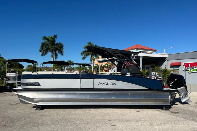 Slide: The Image of 2026 Avalon 2585 Catalina VRB Tri Toon with Mercury 300hp V-8, parked outdoors. - 8