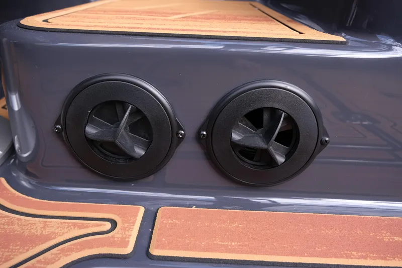 Slide: The Image of 2026 Moomba Tykon boat detail showing dual black vents on deck. - 20