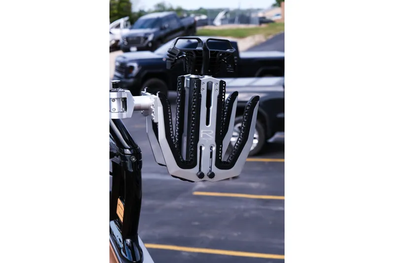 Slide: The Image of Moomba Tykon 2026 boat accessory, featuring a sleek, modern design in a parking lot setting. - 37